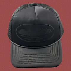 Cortiez All-Black Monochromatic Oval Ship Logo Trucker Hat