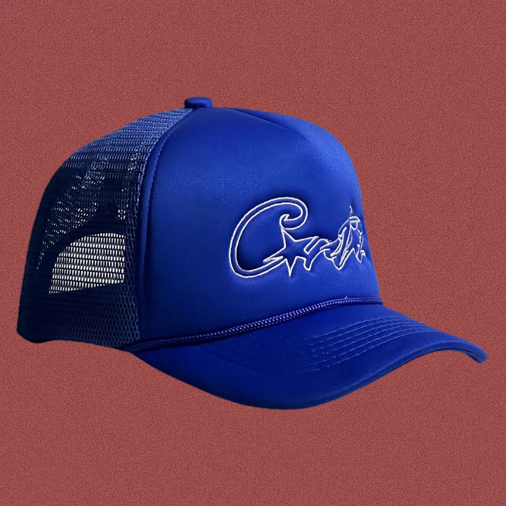 Corteiz Vintage Royal Blue Trucker Hat with White Signature Script and Star Graphic