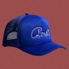 Corteiz Vintage Royal Blue Trucker Hat with White Signature Script and Star Graphic