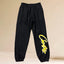 Corteiz Yellow Script Logo Heavyweight Sweatpants black