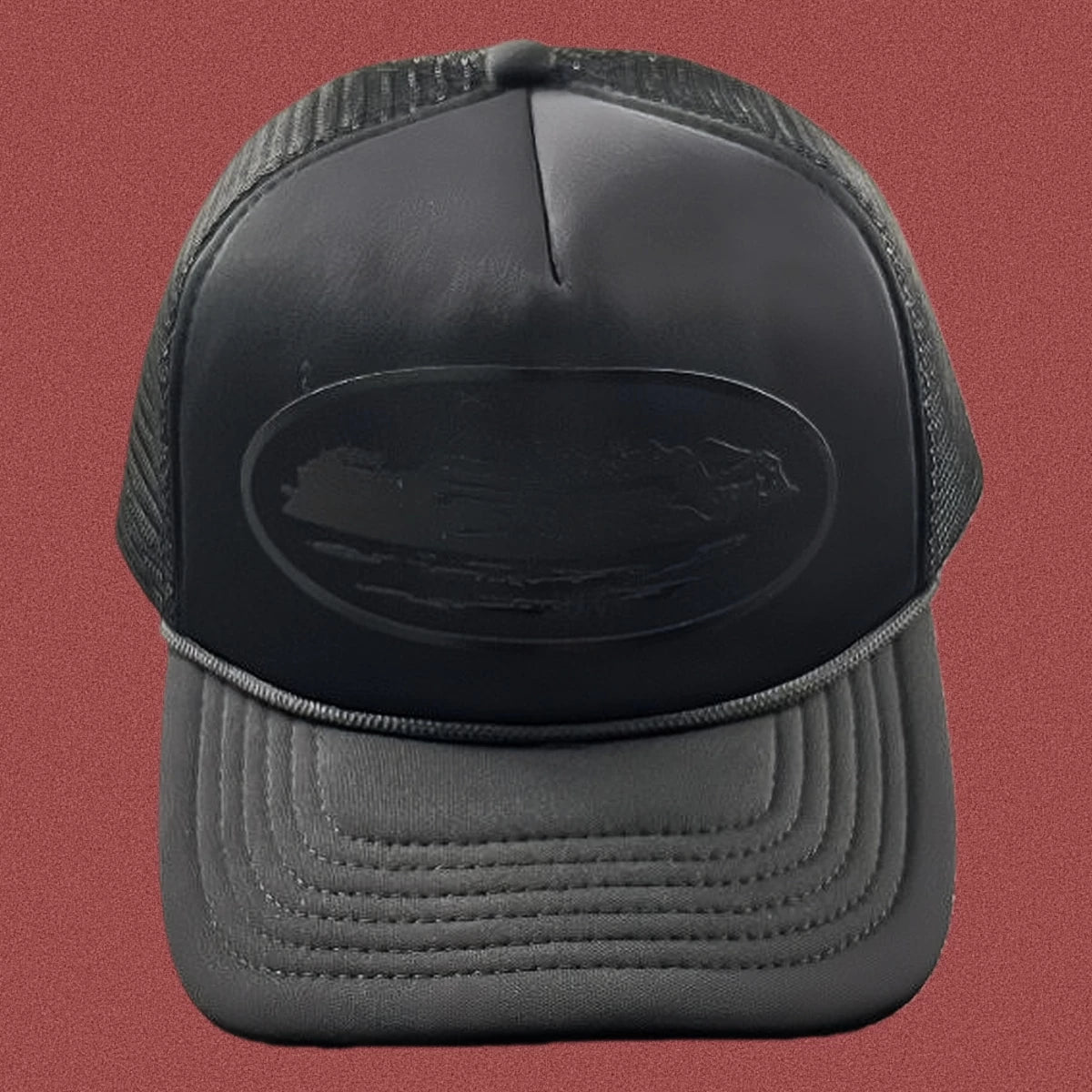Cortiez All-Black Monochromatic Oval Ship Logo Trucker Hat