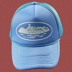 Cortiez Bold White Oval Ship Logo Trucker Hat - Light Blue